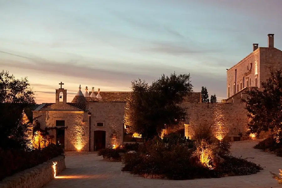 puglia countryside with olive trees at sunset
